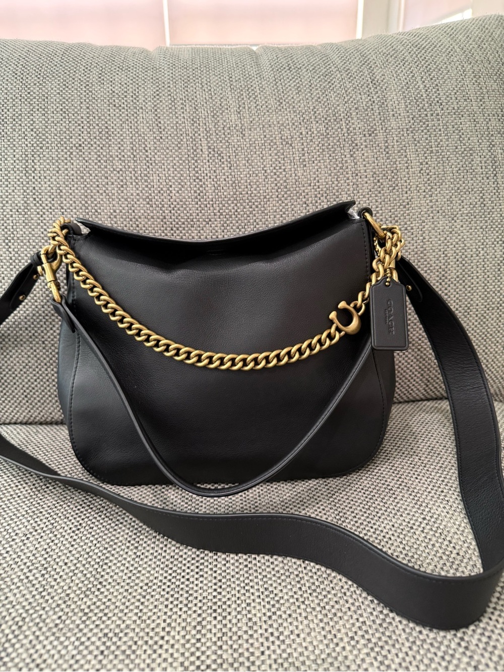 Coach Black Leather Shoulder Bag with Gold Chain Accent